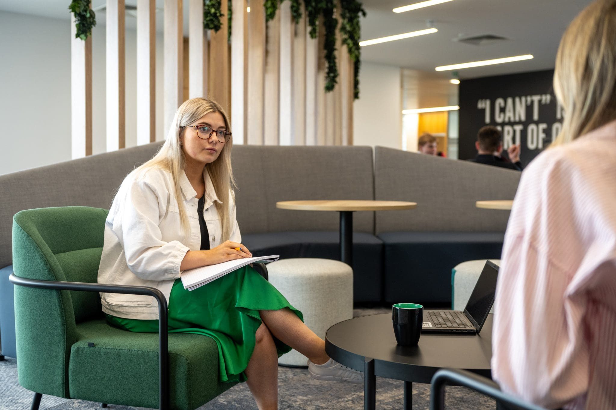 Two woman in meeting while attending an AAB office.