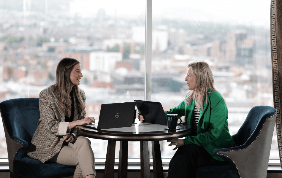 An image of a pair of AAB employees in conversation.