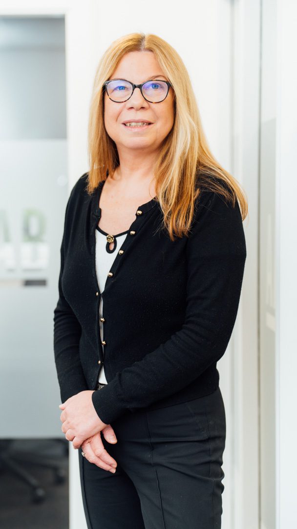 An image of Heather McPhee standing in the Stirling office.