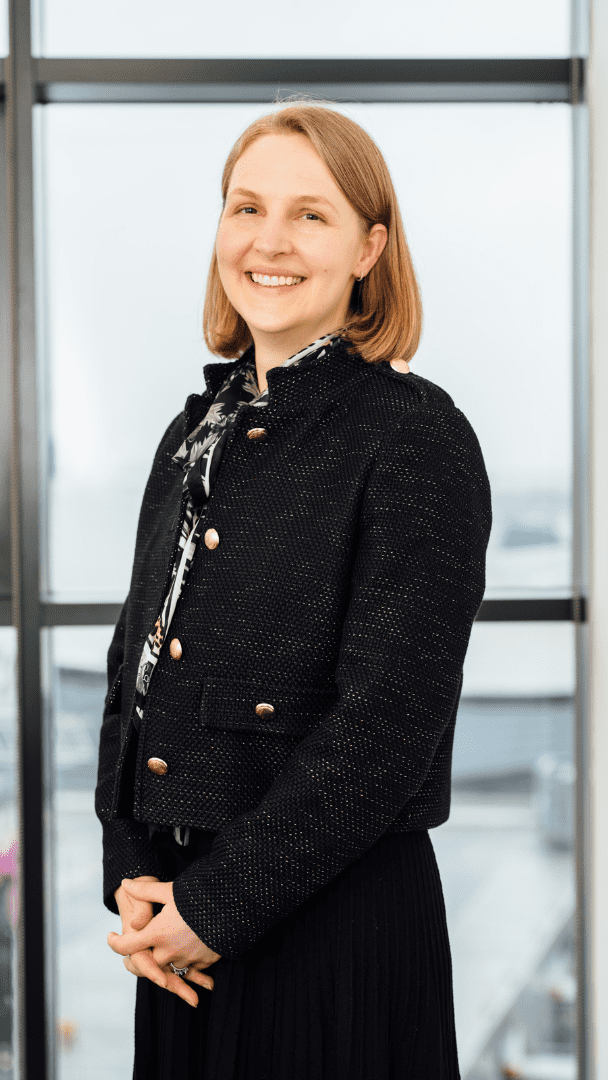 Erica Fitchie standing smiling at the camera